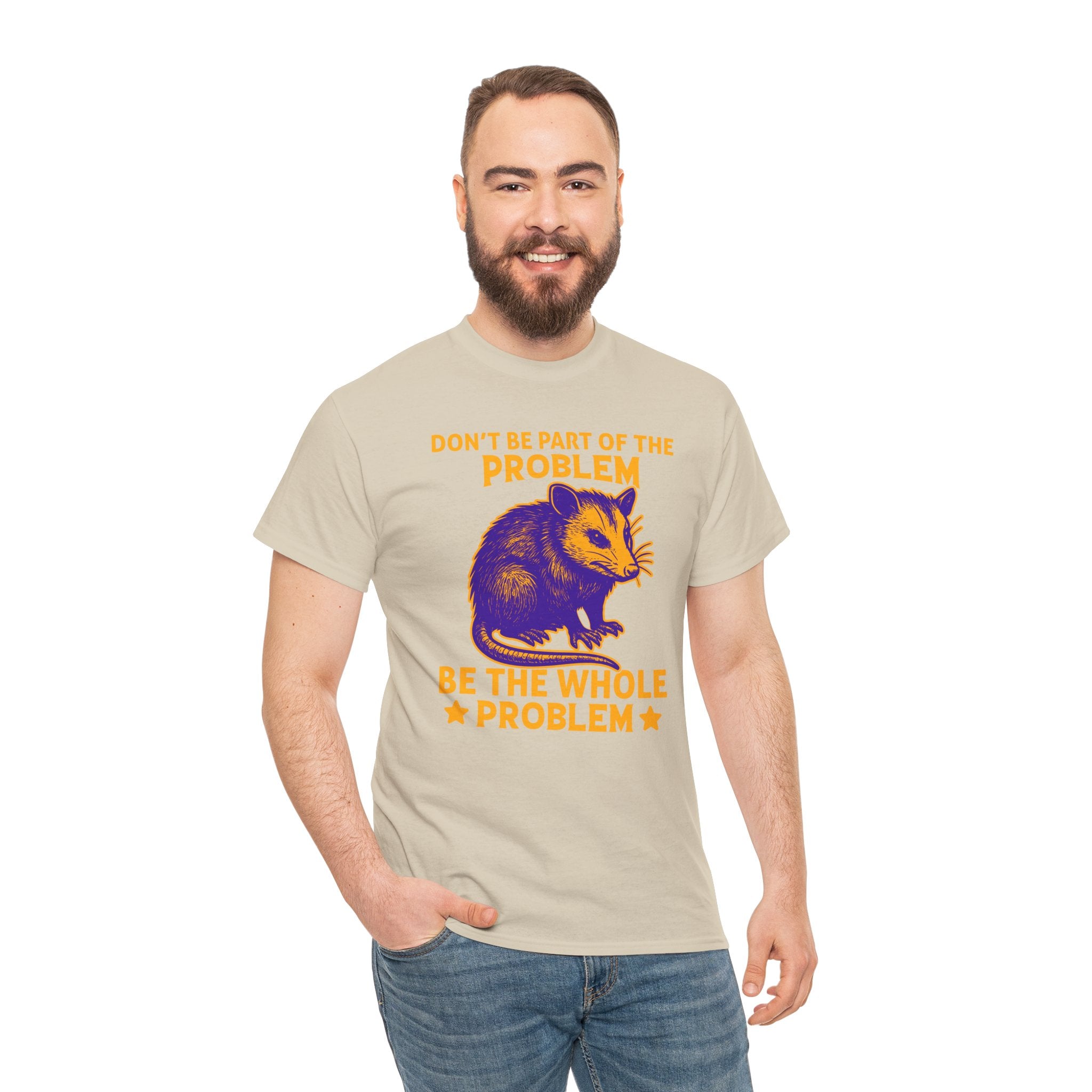 Man wearing a t-shirt with a opossum graphic and text on a white background