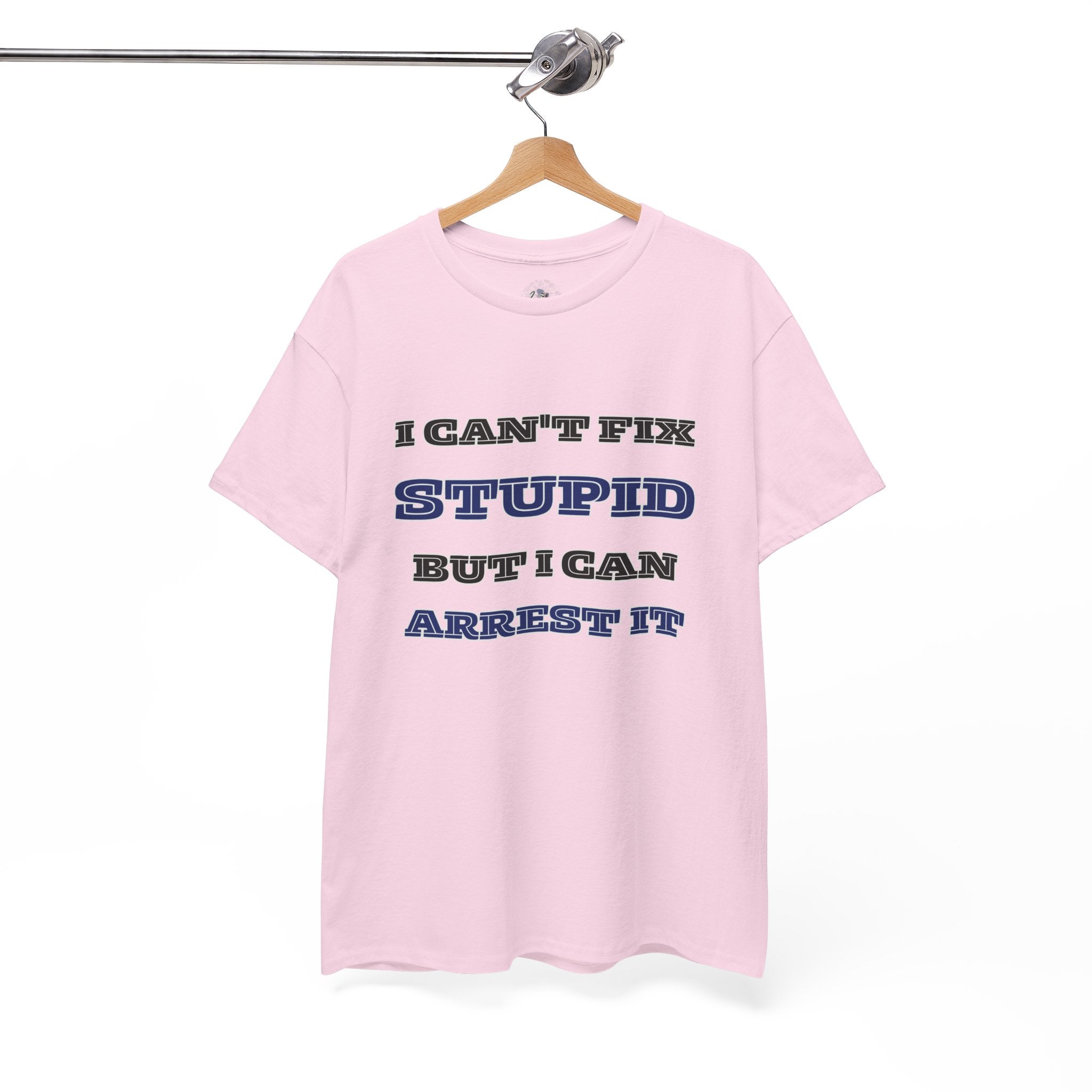 Pink t-shirt with humorous text on a hanger against a white background