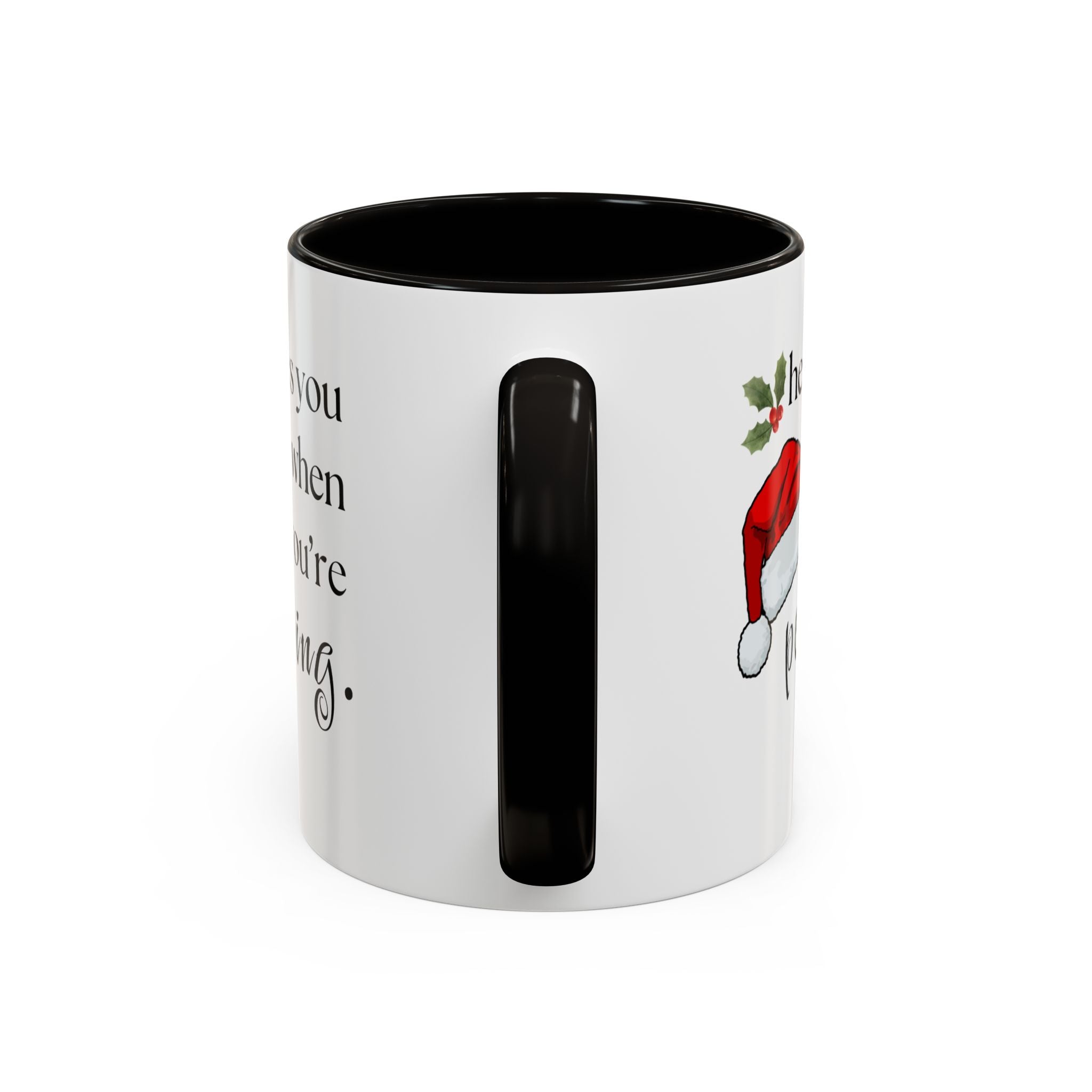 White mug with black interior and handle, featuring a Santa hat design on a white background