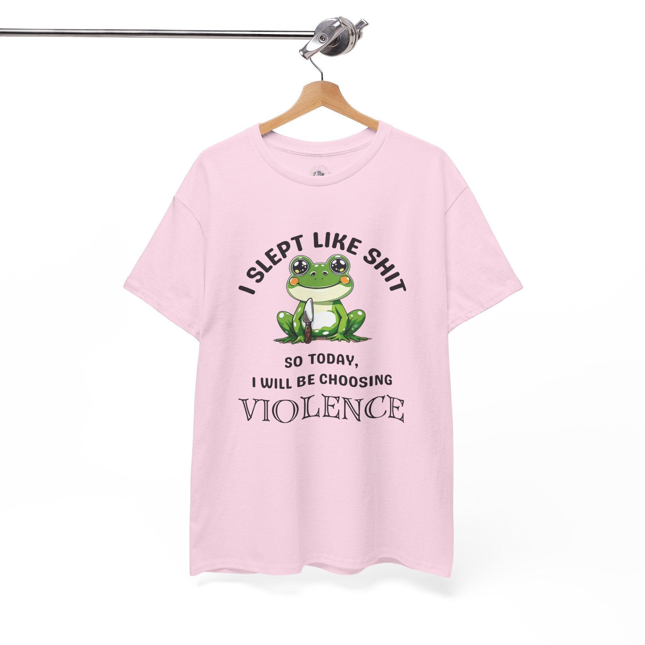 Pink t-shirt with a graphic and text on a hanger against a white background