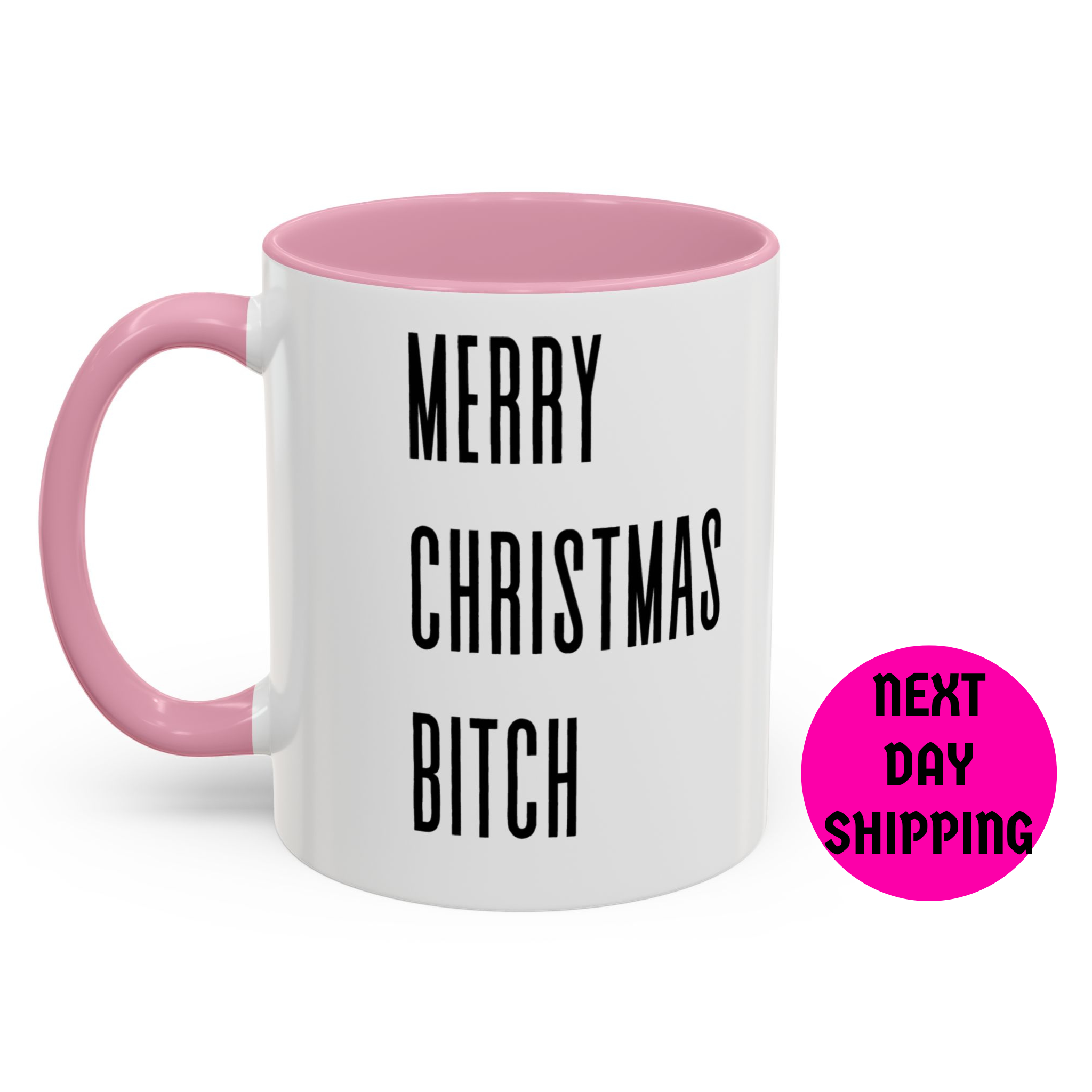 White mug with pink interior and handle, featuring the text 'Merry Christmas Bitch' and a pink circle with 'next day shipping' text on a white background.