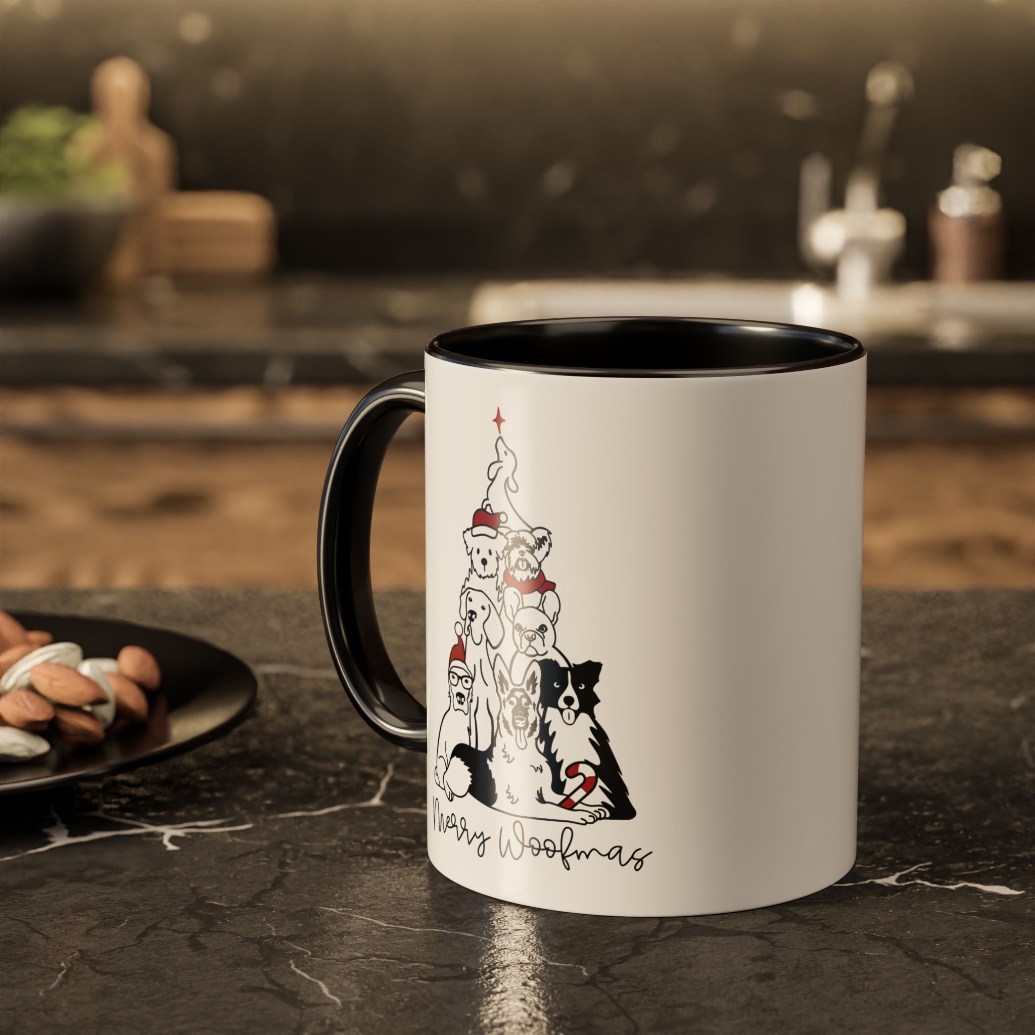 White mug with black interior and handle, featuring a Christmas-themed design of dogs and cats, on a kitchen counter.