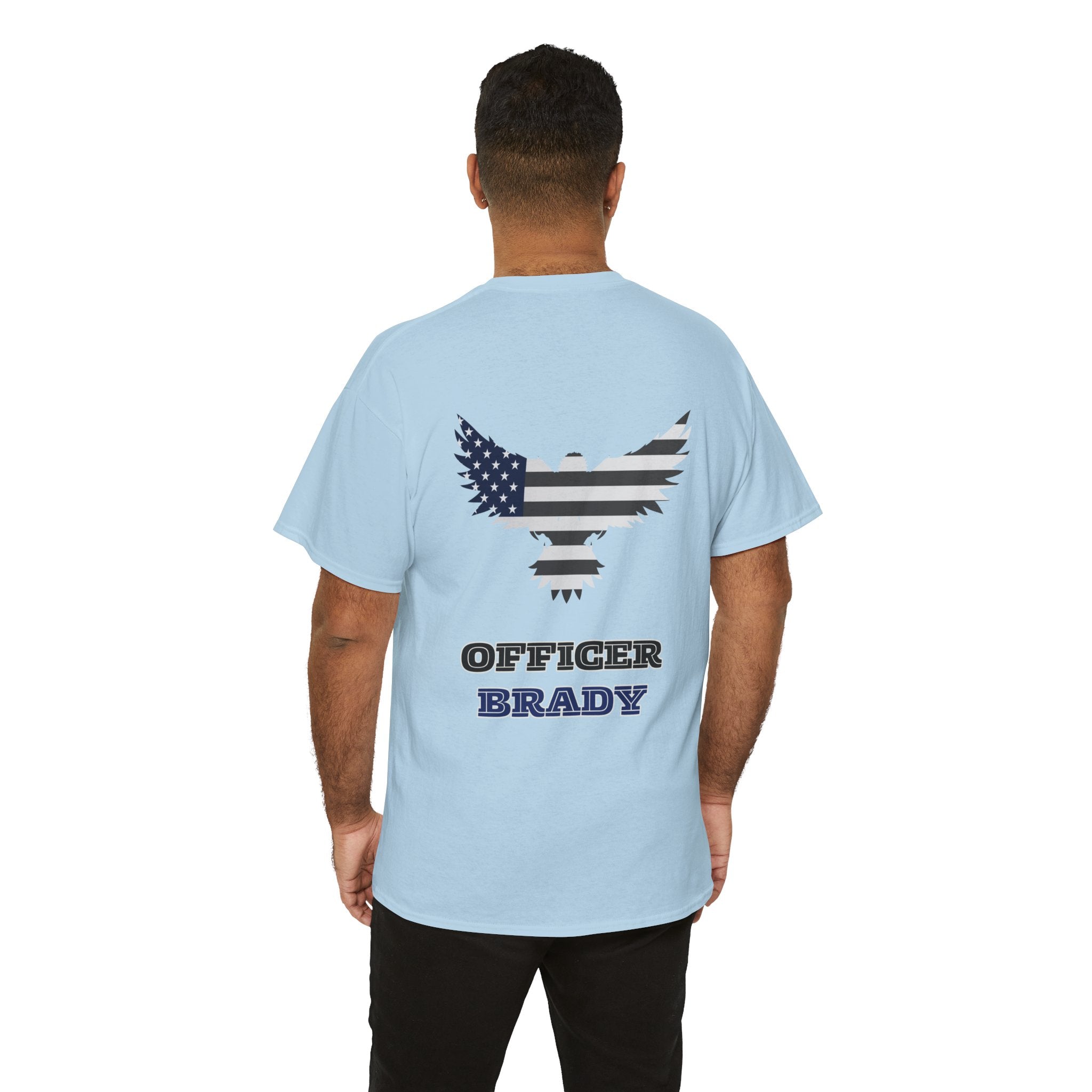 Light blue t-shirt with a graphic and personalized by name text on the back, worn by a person.